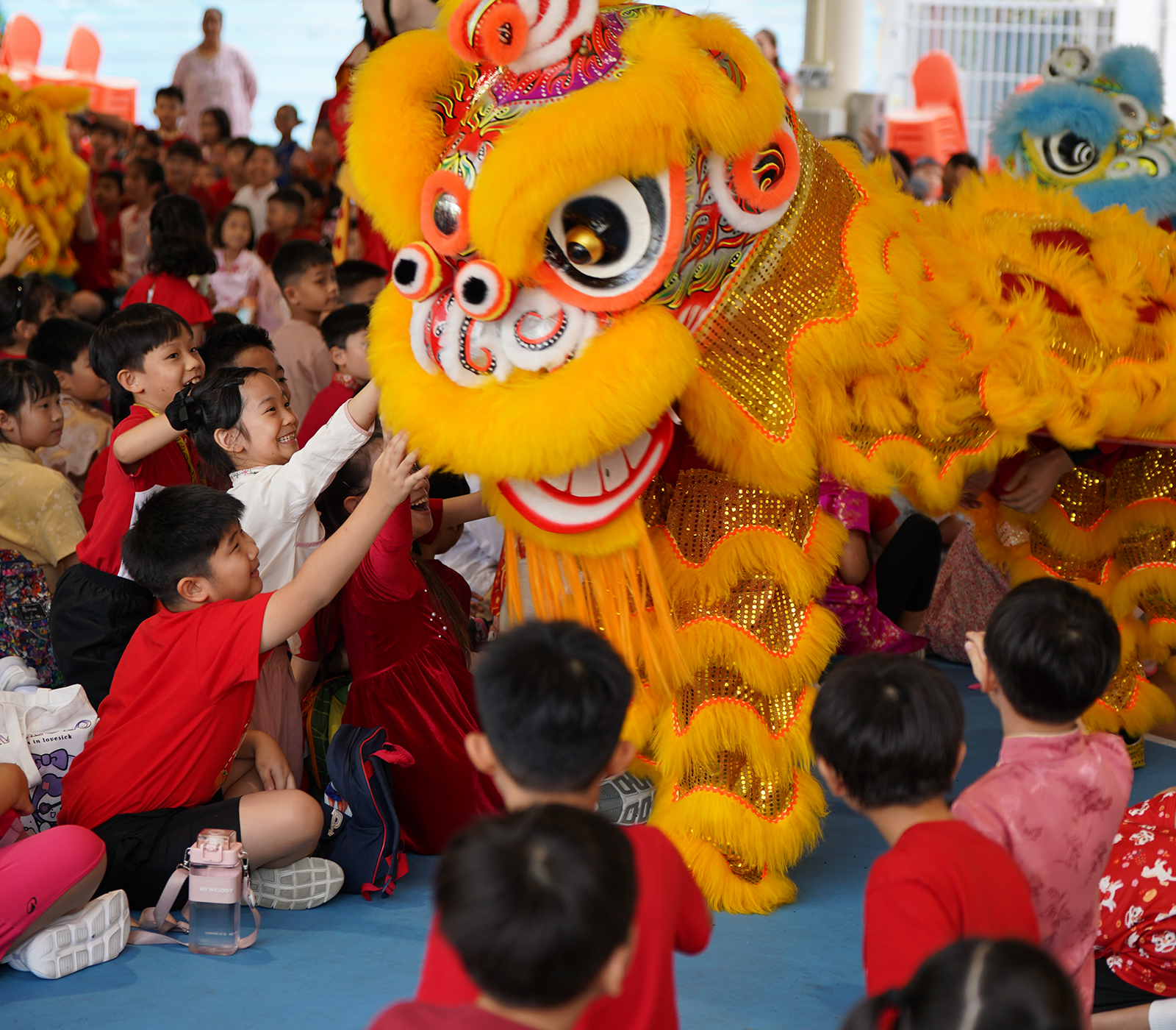 SKGians interacting with the Lion Dancers